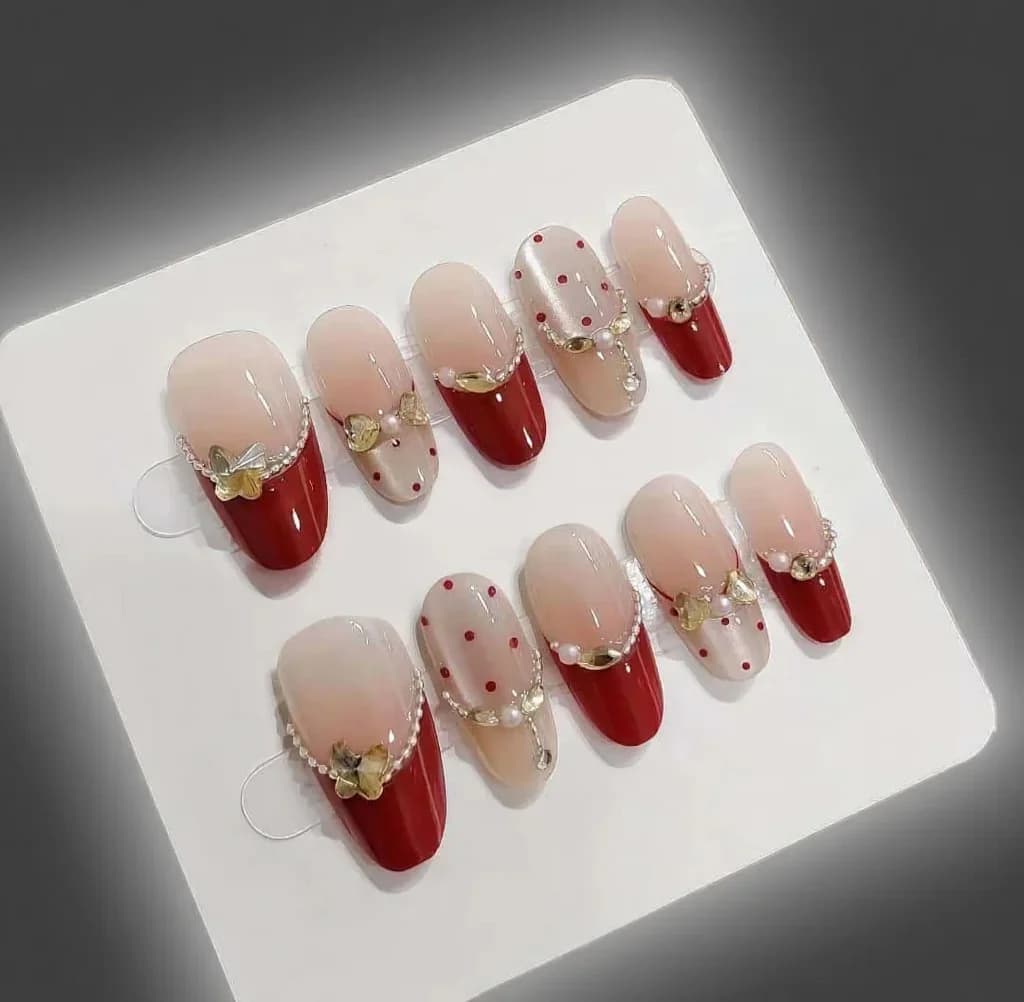 Sarkani mākslīgie nagi ar rhinestones, kaķa acs efekts, vidējs ovāls